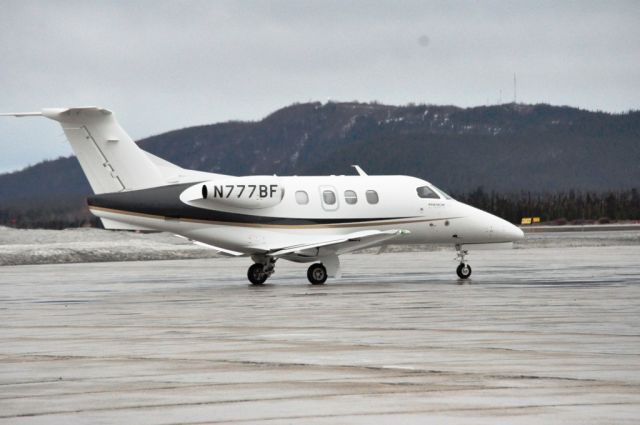 Embraer Phenom 100 (N777BF) - Taxiing to Taxiway Delta runway 08 going overseas.