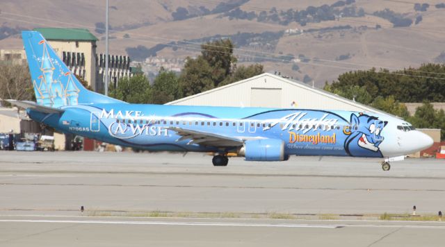 Boeing 737-700 (N706AS) - Disney / Make A Wish taxiing for departure at KSJC, 30R  Had to post this, having a son who is a "Wish Child"