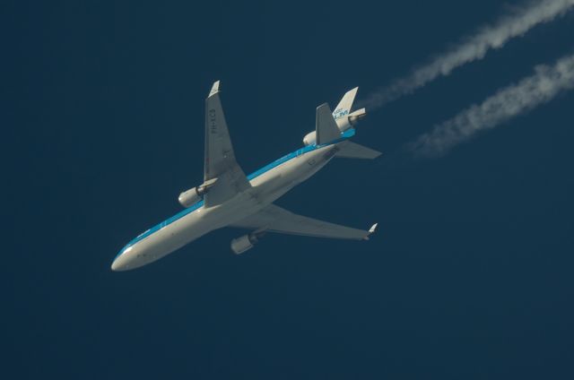 Boeing MD-11 (PH-KCB) - 3-1-15 KLM Royal Dutch Airlines MD-11 (PH-KCB) Photographed 12-10-14 Crossing North West England UK @ FL360 working route Amsterdam-Montreal KLM671.This was one of the very last commercial flights by PH-KCB and I was lucky enough to see and photograph this fine aircraft just before it was retired from service just two weeks later.The KLM MD-11s were much loved by their crew,passengers and aviation enthusiasts worldwide.Pentax K-5.