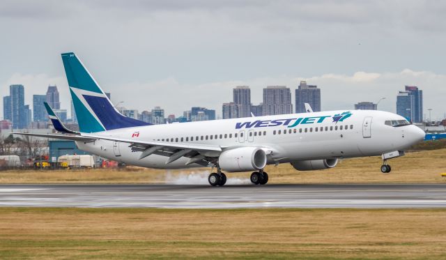 Boeing 737-800 (C-FYBK) - Nice new Westjet 738 sporting the slightly revised logo on the fuselage