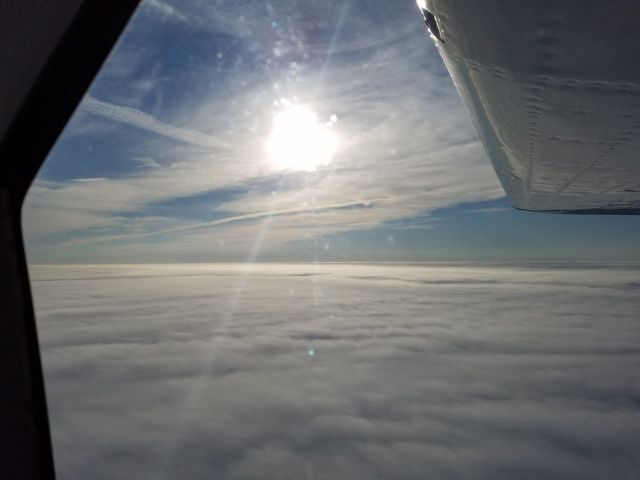 — — - A $100 IFR hamburger hop. 40F, cold, dark and drizzly on the ground, 75F and sunny at 4,000. Its like a trip to the beach in the middle of the winter.