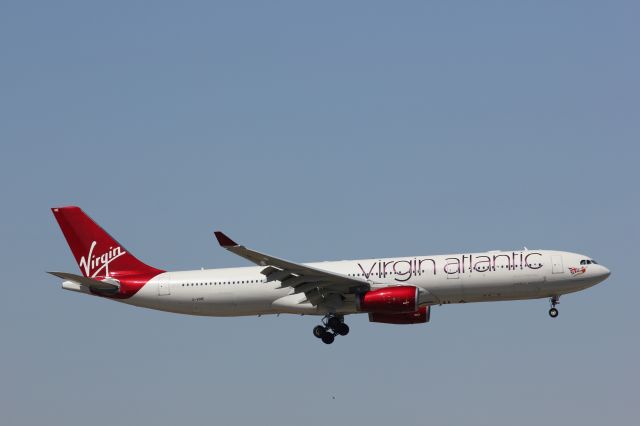 Airbus A330-300 (G-VINE) - "Champagne Belle" landing in Atlanta.