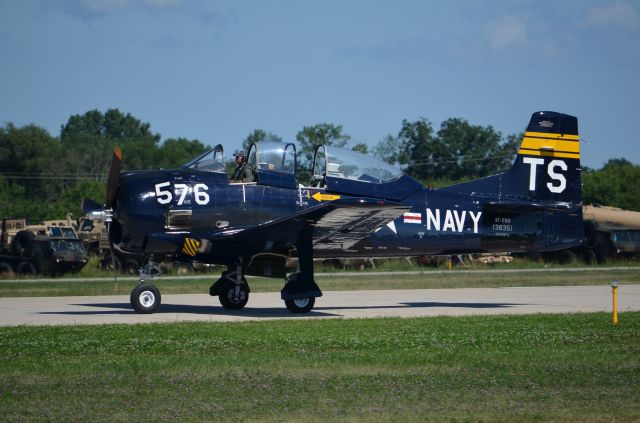 North American Trojan — - EAA 2011 T-28 taxiing back to warbirds area.