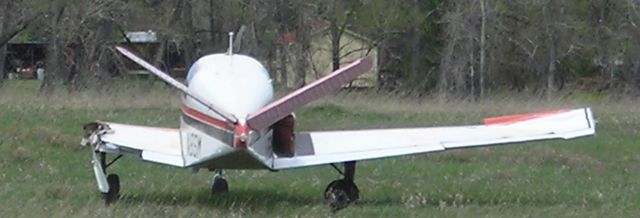 Beechcraft 35 Bonanza (N8SM) - Aircraft in the field the day following the accident.