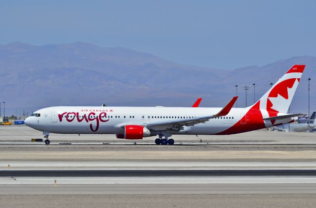 BOEING 767-300 (C-FMWV) - C-FMWV  Air Canada Rouge 1995  Boeing 767-333(ER) - cn 25586 / ln 599 - McCarran International Airport (KLAS)br /Las Vegas, Nevadabr /TDelCorobr /April 17, 2014