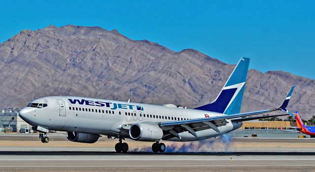 Boeing 737-800 (C-FBWI) - C-FBWI  Westjet 2013  Boeing 737-8CT - cn 39090 / 4364 fleet number 822 - Split Scimitar Wingletbr /br /Las Vegas - McCarran International Airport (LAS / KLAS)br /USA - Nevada October 24, 2015br /Photo: Tomás Del Coro