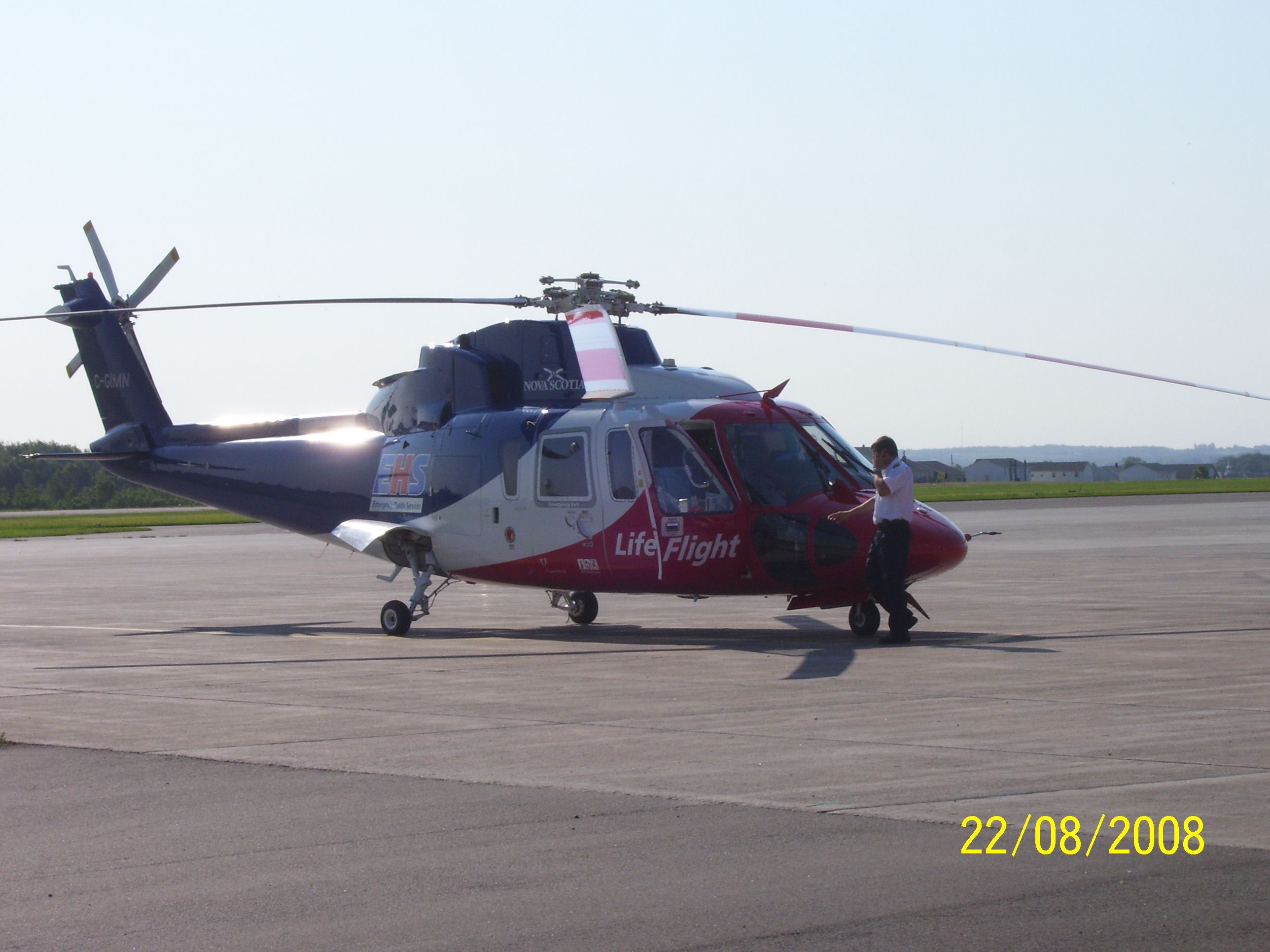 Sikorsky S-76 (C-GIMN) - On the apron at CYYG for a fuel stop.