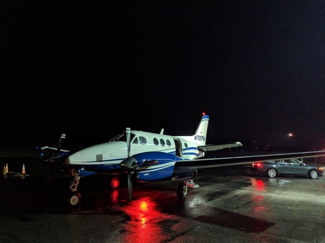 Beechcraft King Air 90 (N110PM) - Late night arrival at AVL in the rain.