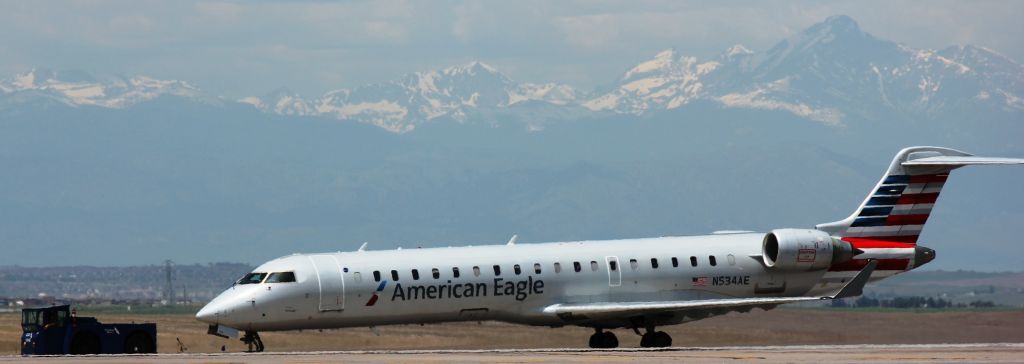 Canadair Regional Jet CRJ-700 (N534AE) - Being towed to its gate after safely landing on 16R with reported brake issues.