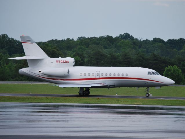 Dassault Falcon 900 (N506BA) - AIR BAHNIK LLC taxiing to runway 2 at KJQF - 6/17/13