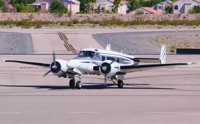 Beechcraft 18 (N5609D) - I caught this 59-year-old Beech E18S on the same day the HU-16 Albatross arrived!