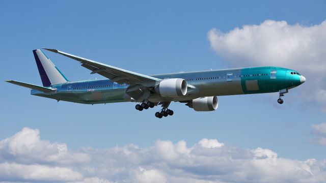 BOEING 777-300 (HZ-AK17) - BOE351 on final to runway 16R to complete its maiden flight on 3/23/13. (LN:1092 cn 41054).