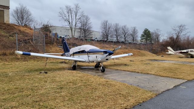 SOCATA TB-21 Trinidad TC (N2802W) - At the tie down on a windy and rainy day