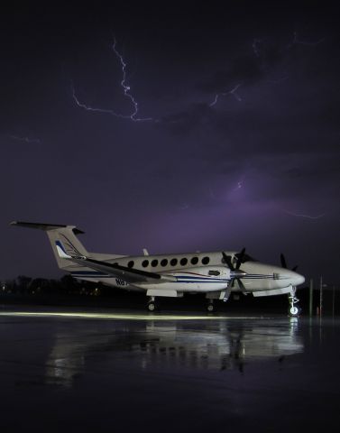 Beechcraft Super King Air 350 (N87CE) - Parked on the ramp after a storm rolled through.