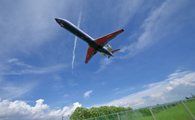 Canadair Regional Jet CRJ-700 (JA11RJ) - 24.Jul.2024br /On the Senri River riverbed at Osaka (Itami) International Airport.br /IBEX Airlines Bombardier CL-600(JA11RJ).br /Photographed with a wide-angle lens against the backdrop of a summer sky.br /Trimming.