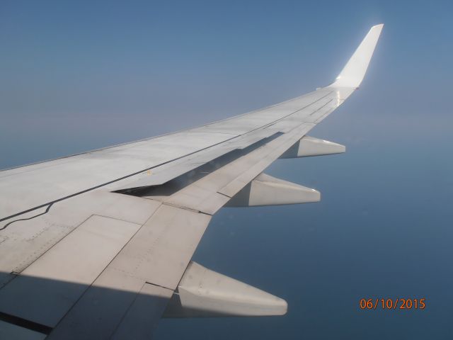 Boeing 737-800 (VH-YOP) - Virgin Australia Boeing 737-800 from Perth Airport to Denpasar. Decending into Denpasar.