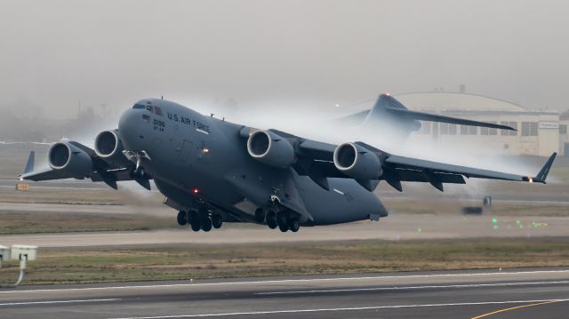Boeing Globemaster III (01-0196) - A C-17 from Martinsburg West Virginia rotates out of Portland in some heavy fog.