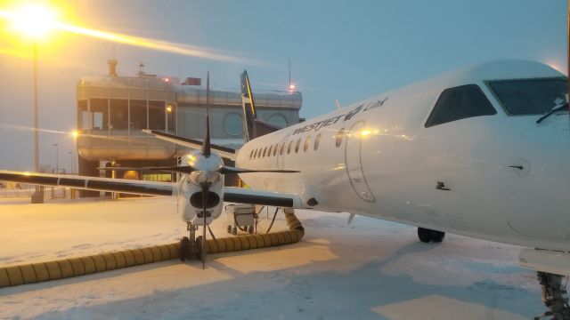 Saab 340 (C-GPCF) - Frigid ground ops at YQL, gotta love the wind.