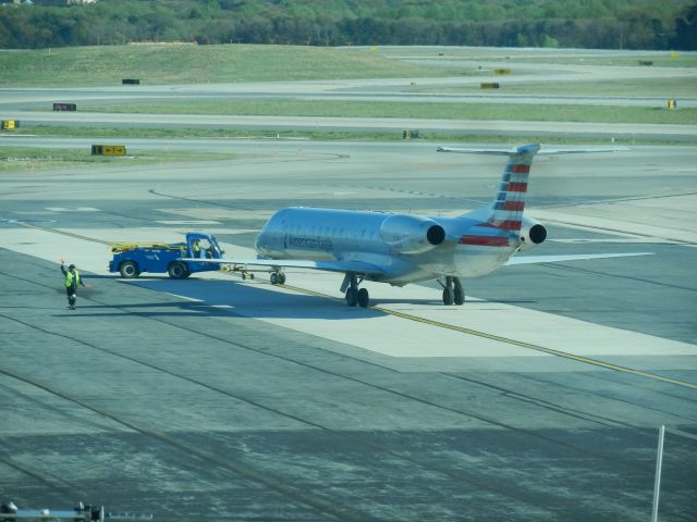 Embraer ERJ-145 (N698CB) - An American Eagle (Operated By Envoy Air) Embraer ERJ-145 Gets Pushed Back For A Flight To Chicago 