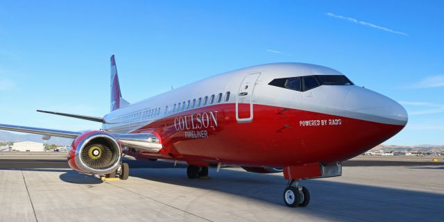 BOEING 737-300 (N137CG) - This Coulson Group B733 "Fireliner" (N137CG, ex-Southwest N617SW) is captured as it sits on the Atlantic Aviation ramp in the shadow of the Reno-Tahoe International control tower.br /The Coulson Group acquired six older model 737s from Southwest Airlines and are converting them into firebombers. This one, Tail #137, arrived at RNO on Saturday afternoon and I was contacted to photograph it. At sunrise the next morning, as the shadow of the control tower was momentarily stretched out far enough to "blanket" this awesome aircraft, I snapped this shot.