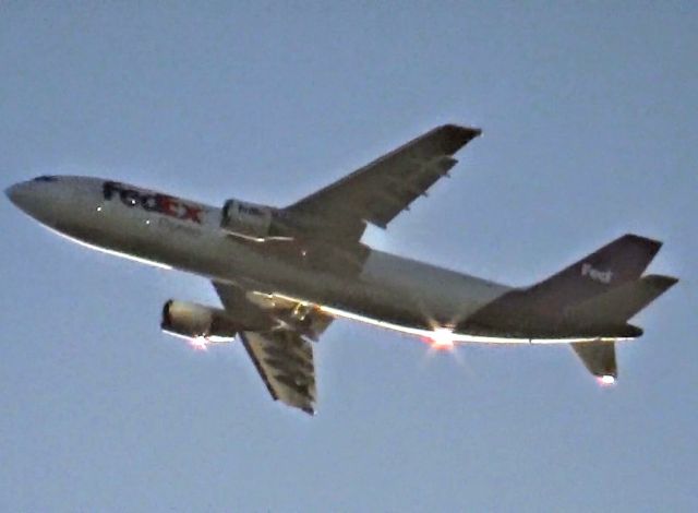 Airbus A300F4-600 (N746FD) - Climbing away from John Wayne bound for Memphis.