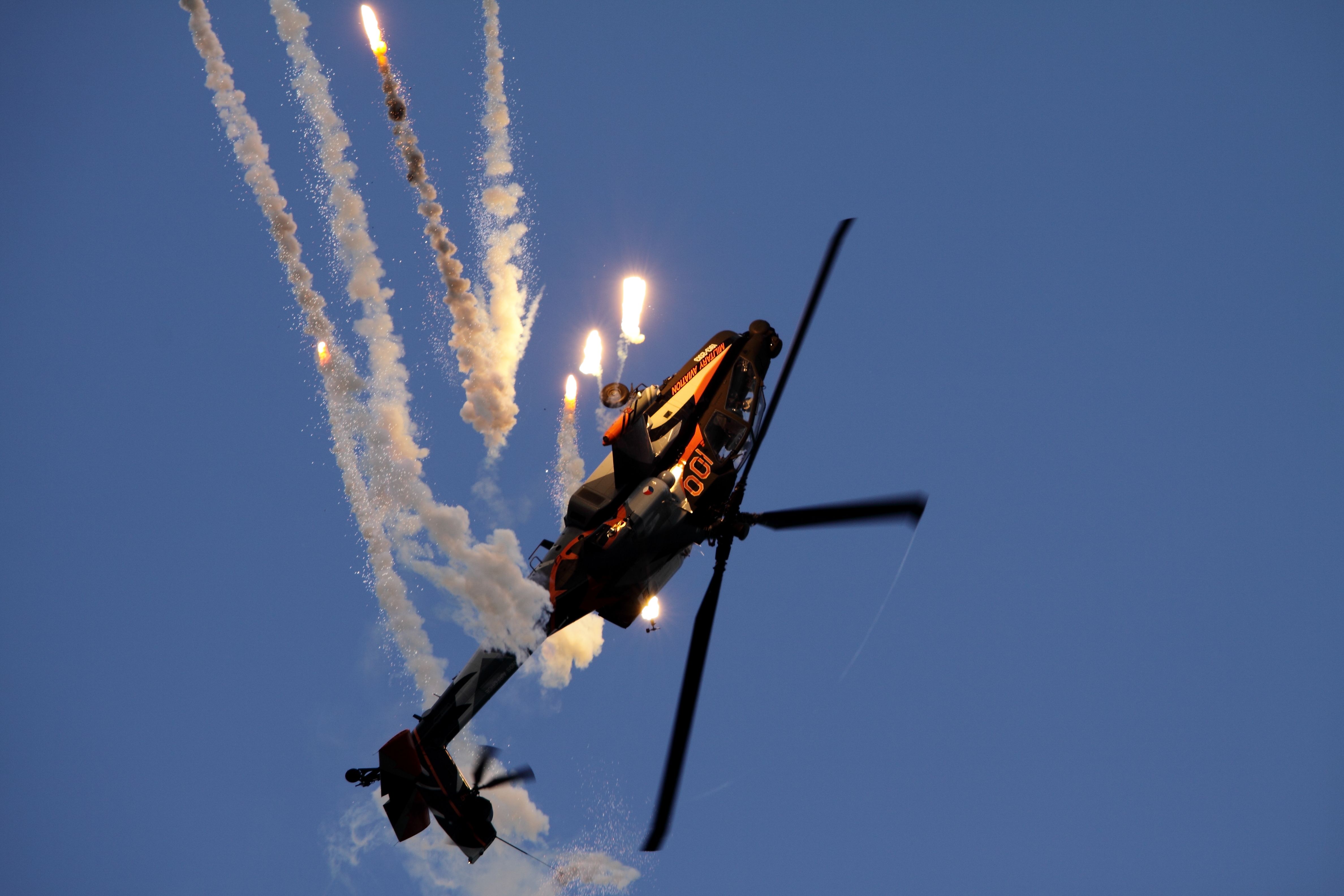 Boeing Longbow Apache (Q17) - AH-64DN Apache Q-17 from the Royal Netherlands Air Force, Releases some flares during an airdisplay. 