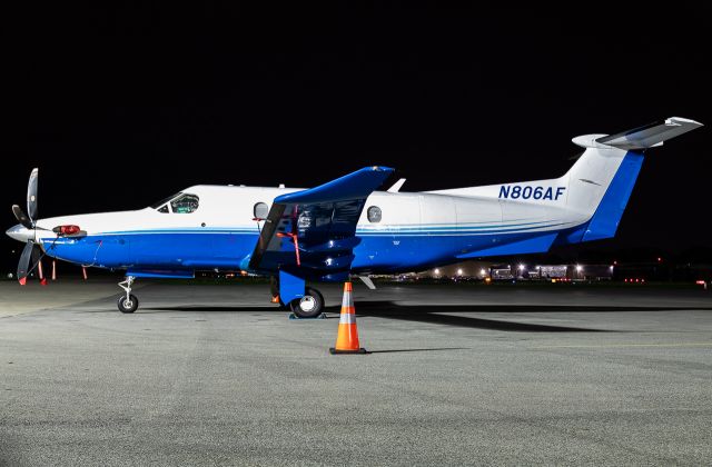 Pilatus PC-12 (N806AF) - PC12 resting under a calm, cloudy sky.