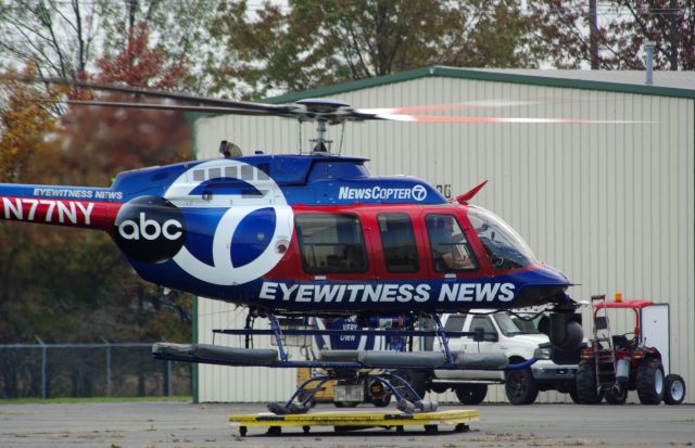 Bell 407 (N77NY) - LINDEN AIRPORT-LINDEN, NEW JERSEY, USA-NOVEMBER 07, 2023: A news helicopter from one of the local New York City television stations is seen by RF taking off at approximately 1353 hrs.