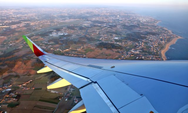 Airbus A320 (CS-TNV) - Flight Porto/Funchal. Takeoff from Porto(LPPR).Airport in the distance on the left. 2022 May.