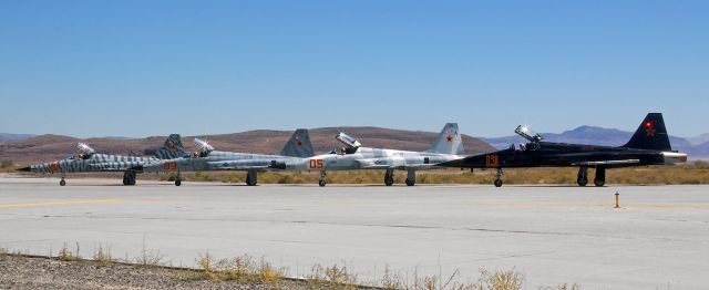 Northrop RF-5 Tigereye (76-1578) - * Suggest clicking on FULL to obtain the best view of this pic. *br /Four F-5 Tigers of Top Gun's VFC-13 "Fighting Saints," all wearing different aggressor camo paint schemes, are seen here notched on Alpha awaiting tower permission to taxi on to 31L and launch.