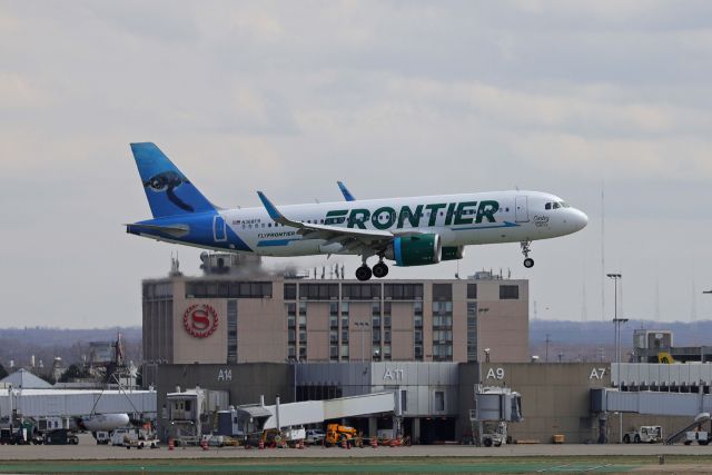 N368FR — - A new Frontier A320-251neo, Cortez the Green Turtle, passing by the Sheraton Airport Hotel on short-final for RWY 24L on 31 Mar 2021.