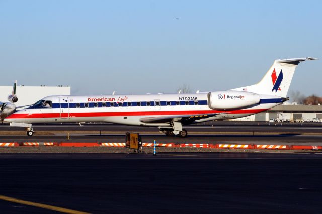 Embraer ERJ-135 (N703MR) - Seen here on 24-Dec-06.  Ferried to KIGM 16-Nov-09 for storage.