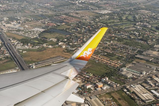 Airbus A319 (A5-JSW) - The flight to Paro is banking over Bangkok just after takeoff. This is Druk Airs first A319 with Sharklets. Incidentally "JSW" in the registration of this brand new aircraft are the initials of the immediate past ruler of Bhutan, King Jigme Singye Wangchuck. 31st March, 2015