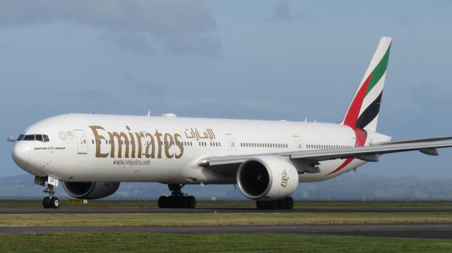 BOEING 777-300ER (A6-EGF) - Departing for Bali.