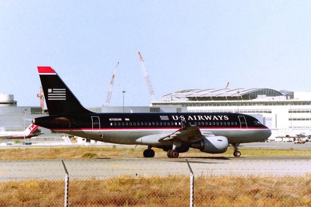 Airbus A319 (N705UW) - KSFO - in my book, the #2 worst paint scheme of all time since I've been alive, 2nd only to United Airlines 'battleship gray' paint scheme - I know Gman will disagree but an A321 in this color was even worse....