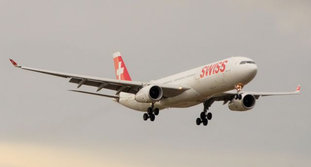 Airbus A330-300 (HB-JHG) - A Swiss A330-300 Reg#HB-JHG Adorns the Miami Airways"On the late afternoon of heavies coming in from Europe"And other localities!