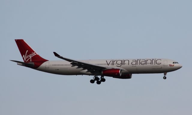 Airbus A330-300 (G-VINE) - Operating LHR-JFK diverted to Logan due to weather. 