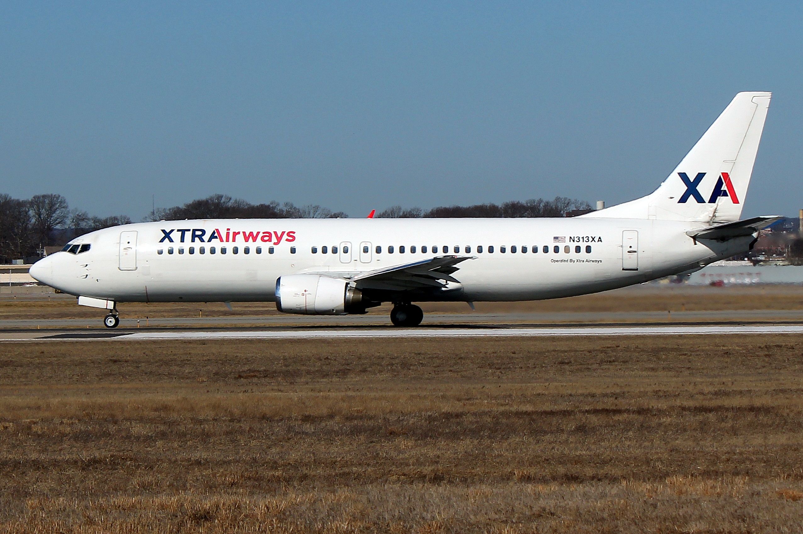 BOEING 737-400 (N313XA) - Casino Express 8792 departing to Willow Run