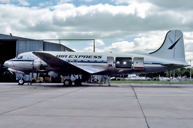 Piper PA-25 Pawnee (VH-EDA) - AIR EXPRESS - DOUGLAS DC4-1000-DS - REG : VH-EDA (CN 42917/12 - ESSENDON MELBOURNE VIC. AUSTRALIA - YMEN 3/10/1977 35MM SLIDE CONVERSION USING A LIGHTBOX AND A NIKON L810 CAMERA IN THE MACRO MODE.