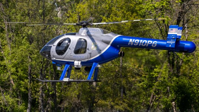 MD HELICOPTERS MD-520N (N910PG) - N910PG hovering on College Park Airport's runway 33 after a flight from National Harbor in DC