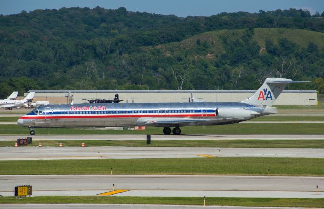 McDonnell Douglas MD-83 (N866TW) - American 1617 departs Omaha's Runway 32L for DFW at 3:48 PM.  This was the last American MD83 I ever got to see.  What a beauty!  Photo taken August 6, 2019 with Nikon D3200 at 240mm.