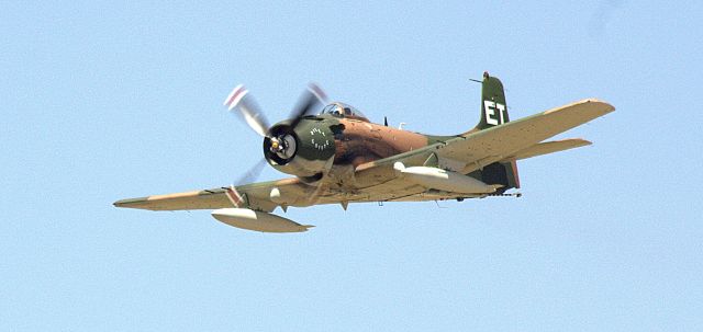 Douglas AD Skyraider (N39606) - Sandy making a "napalm run"