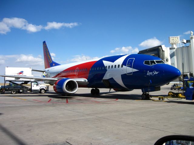 Boeing 737-700 (N352SW) - Parked at gate C35 on C concourse at DIA.