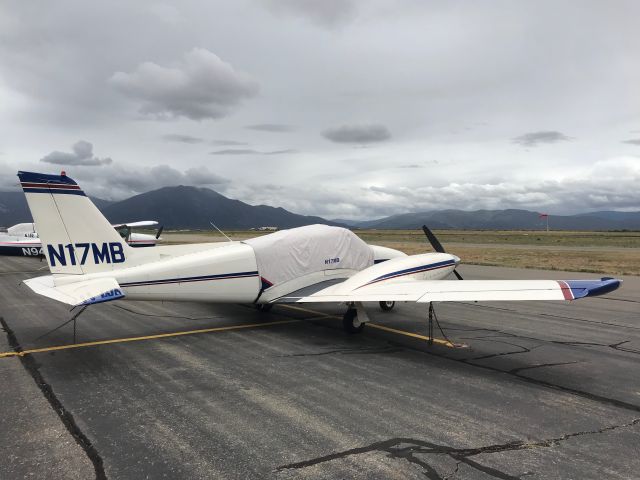 Piper PA-30 Twin Comanche (N17MB) - On the ramp at Taos, New Mexico. Sangre de Cristo mountains can be seen in the background.