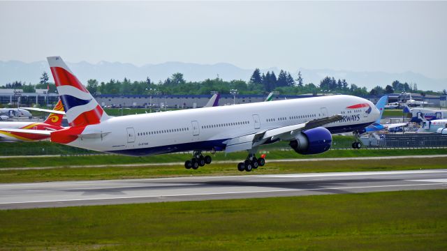 BOEING 777-300 (G-STBK) - BOE77 on short final to Rwy 16R during its maiden flight on 5/15/14. (LN:1204 / cn 42121).