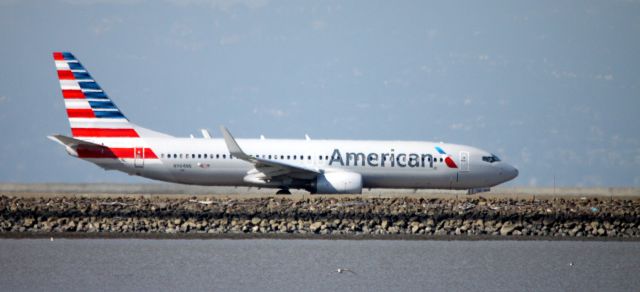 Boeing 737-800 (N964NN) - AA # 1371 taxing for departure 28L to KORD   05-30-2015