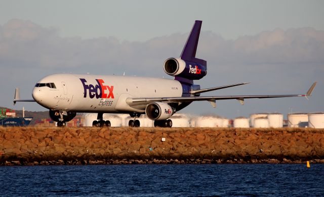 Boeing MD-11 (N602FE) - Taxiing to the Freight Ramp via Taxiway Alpha.