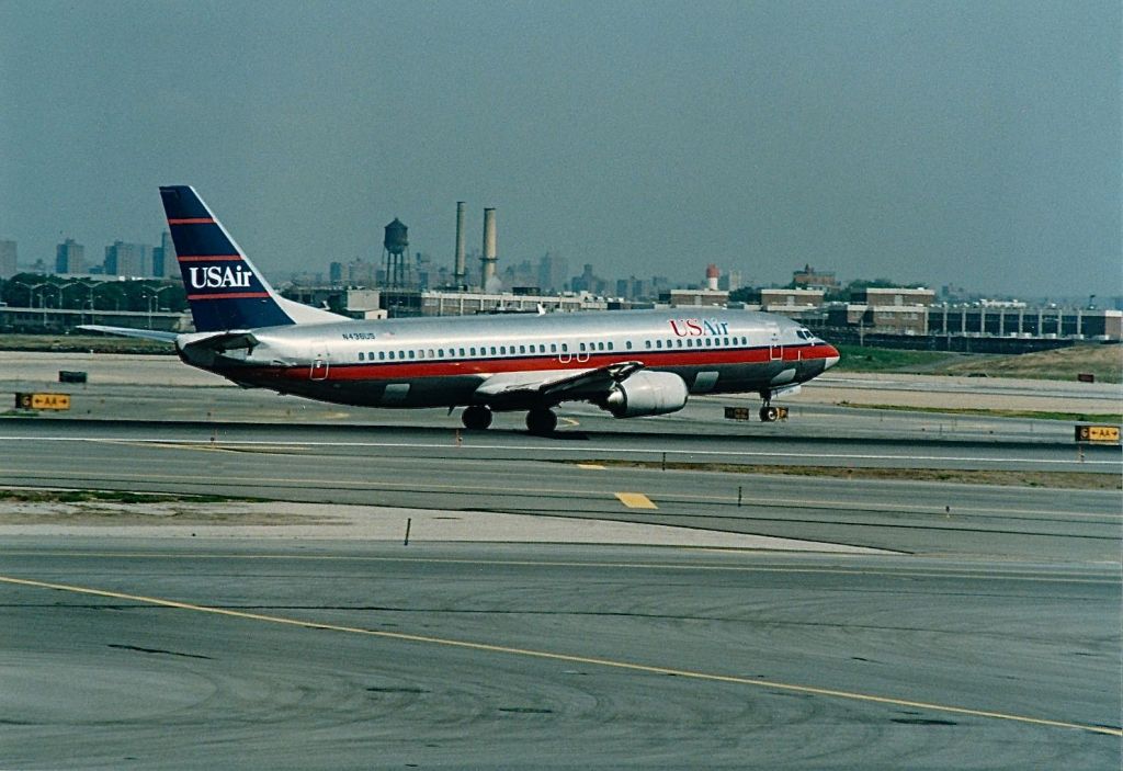 Boeing 737-700 (N438US) - US Air B-737 taking off at KLGA