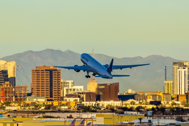 Boeing 777-200 (N227UA) - A United Airlines 777-200 taking off at PHX on 1/17/23. Taken with a Canon R7 and Tamron 70-200 G2 lens.