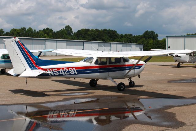 Cessna Skyhawk (N54291) - 1981 Cessna 172P Skyhawk with a nice reflective puddle. Photo taken on 6/10/2021.